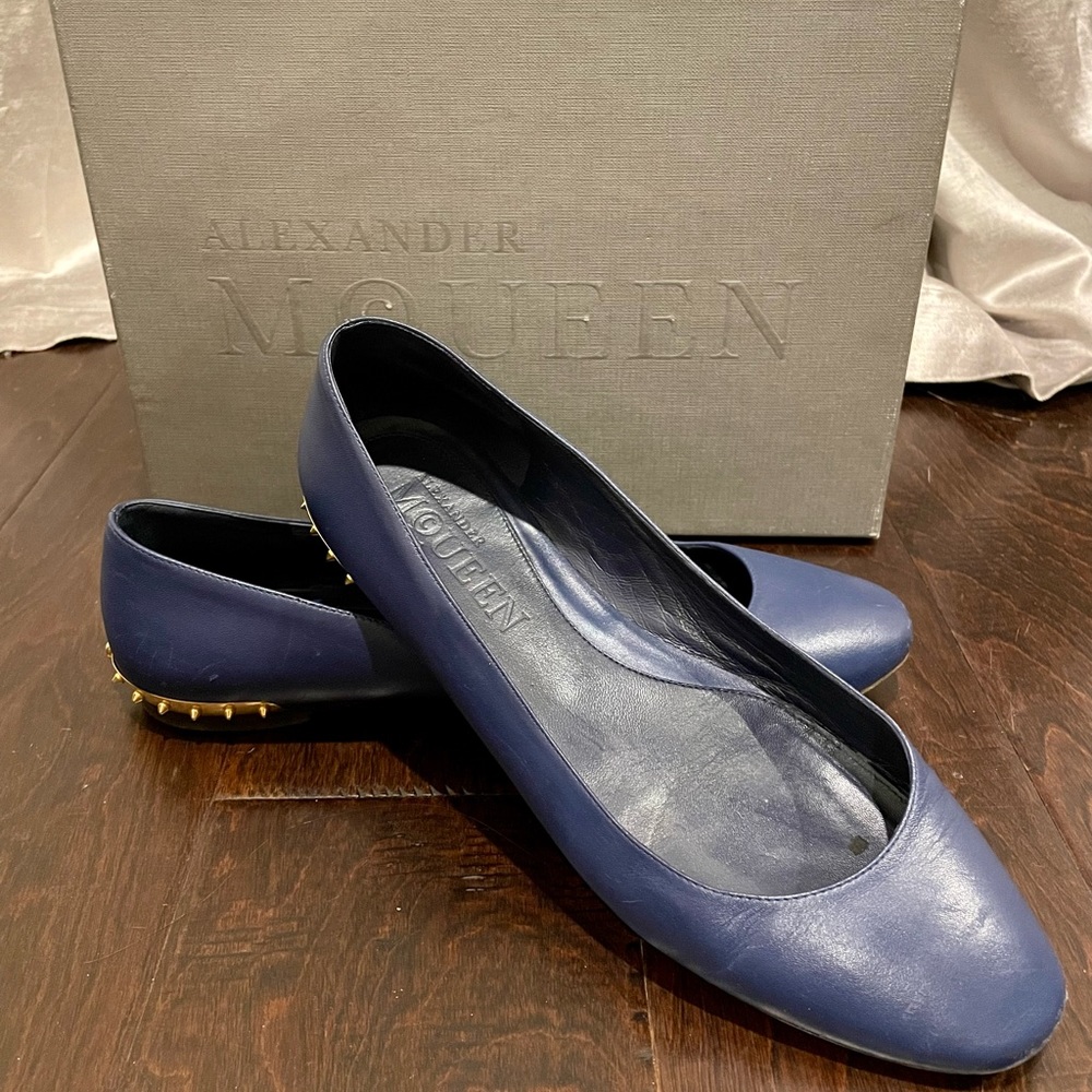 Alexander McQueen Blue Ballet Flat with gold skull details on heel.